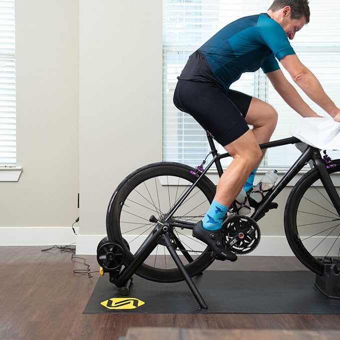 Saris Bike Trainer Accessory Mat - 65" x 36" PVC Foam - Non-Slip Surface Protects Floors from Sweat & Grime, Durable for Indoor Cycling and Exercise Equipment